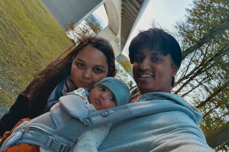 International newcomers smiling at the camera